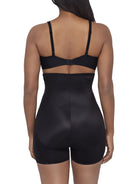 a woman wearing a black high waisted tummy tucker shaping short miraclesuit shapewear body shaper boyshort