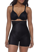 a woman wearing a black high waisted tummy tucker shaping short miraclesuit shapewear body shaper boyshort