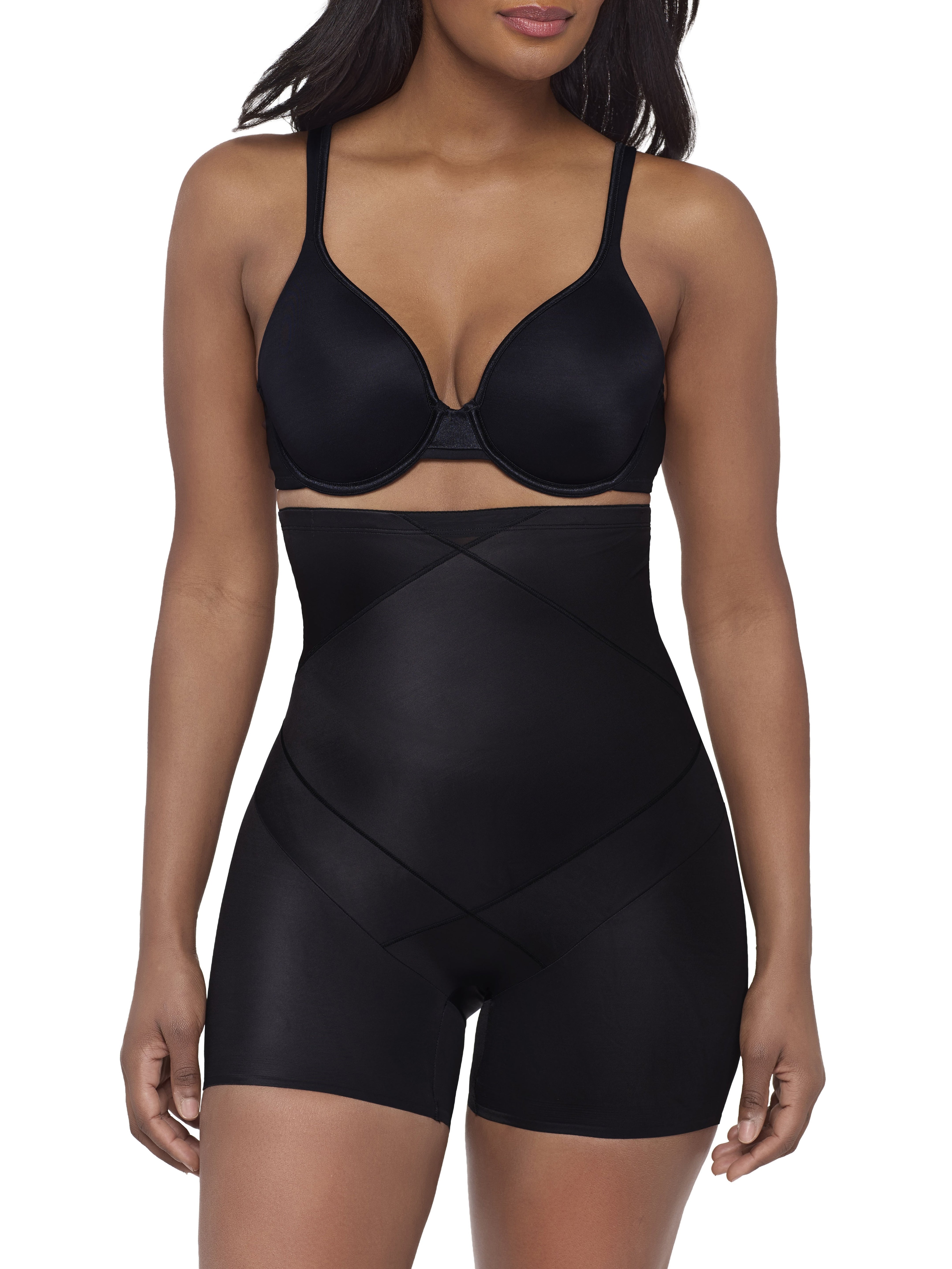 a woman wearing a black high waisted tummy tucker shaping short miraclesuit shapewear body shaper boyshort