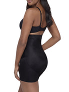 a woman wearing a black high waisted tummy tucker shaping short miraclesuit shapewear body shaper boyshort