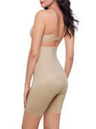 a woman wearing a beige high-waist thigh slimmer