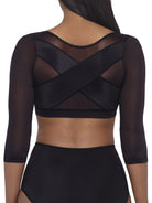 a woman wearing a black back and arm smoothing cami shapewear