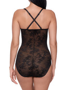 Black lace bodysuit worn by a model on a white background