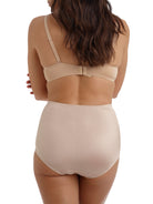 a woman wearing nude tummy control underwear shapewear