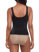 a woman wearing a black tummy control shaping cami shapewear