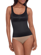 a woman wearing a black tummy control shaping cami shapewear