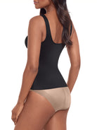 a woman wearing a black tummy control shaping cami shapewear