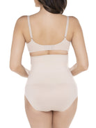 a woman wearing a beige high-waist shaping brief