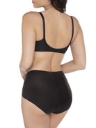 a woman wearing black tummy control underwear