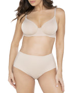 a woman wearing nude tummy control underwear