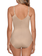 a woman wearing a nude tummy control body shaper shapewear