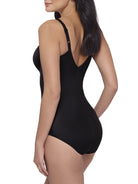 a woman wearing a black miraclesuit bodysuit shapewear full body shaper