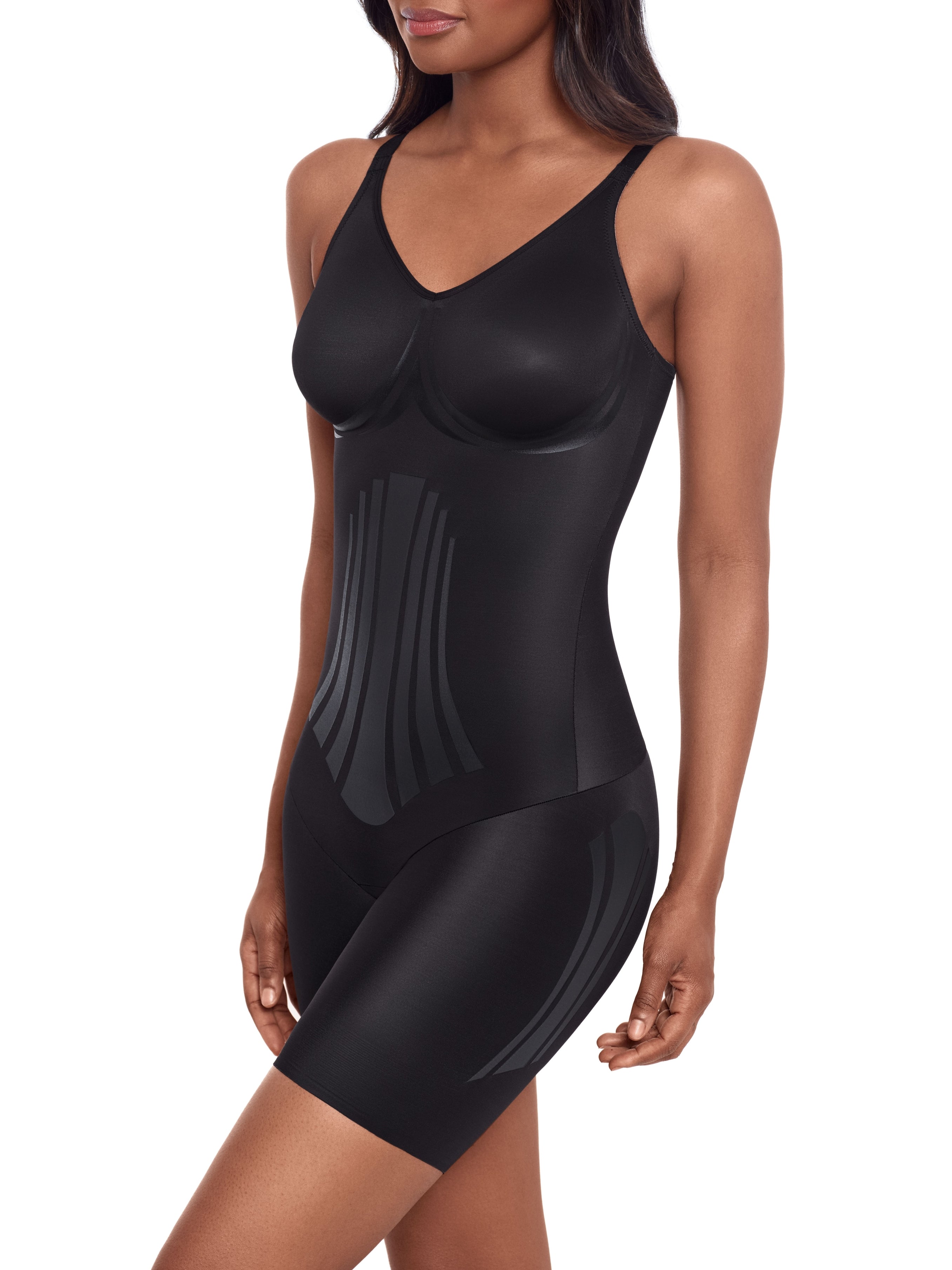 a woman wearing a black tummy control shaping bodysuit body shaper shapewear