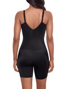 a woman wearing a black tummy control shaping bodysuit body shaper shapewear