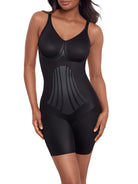 a woman wearing a black tummy control shaping bodysuit body shaper shapewear