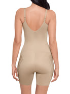 a woman wearing a beige shaping bodysuit romper