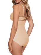 a woman wearing a beige shaping brief