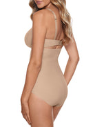 a woman wearing a beige high waisted tummy control brief