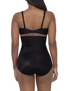 a woman wearing a black high waisted tummy control brief miraclesuit shapewear body shaper