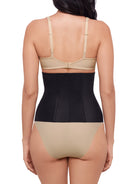 a woman wearing a black waist cincher waist trainer shapewear