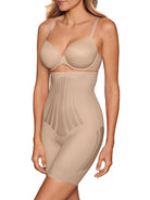 a woman wearing a nude high waisted tummy control shapewear short