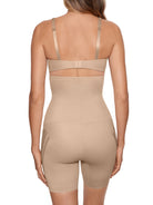 a woman wearing a nude high waisted tummy control shapewear short