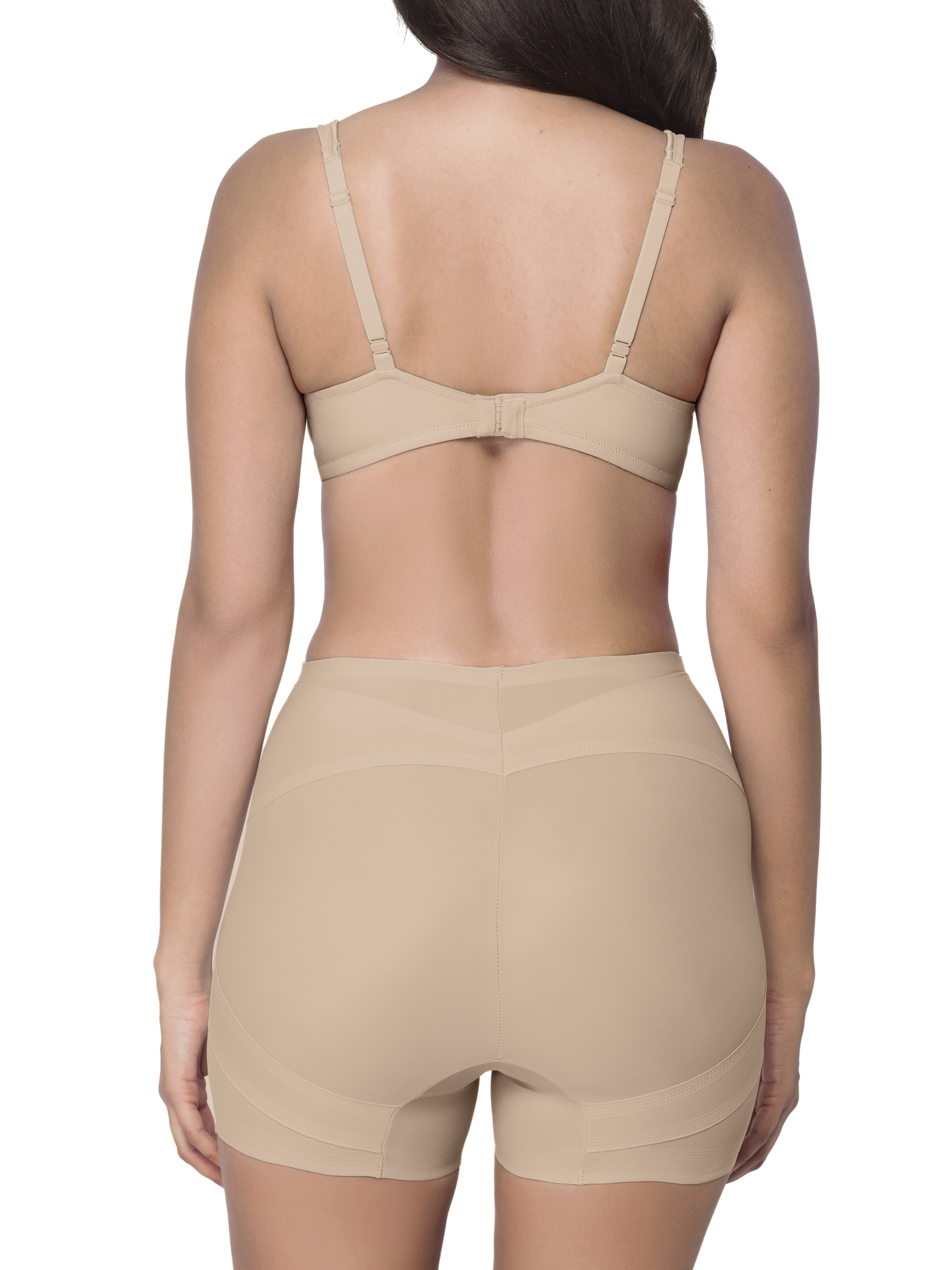 Beige shapewear short on a model against a white background