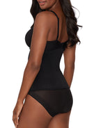 a woman wearing a black waist trainer waist cincher shapewear