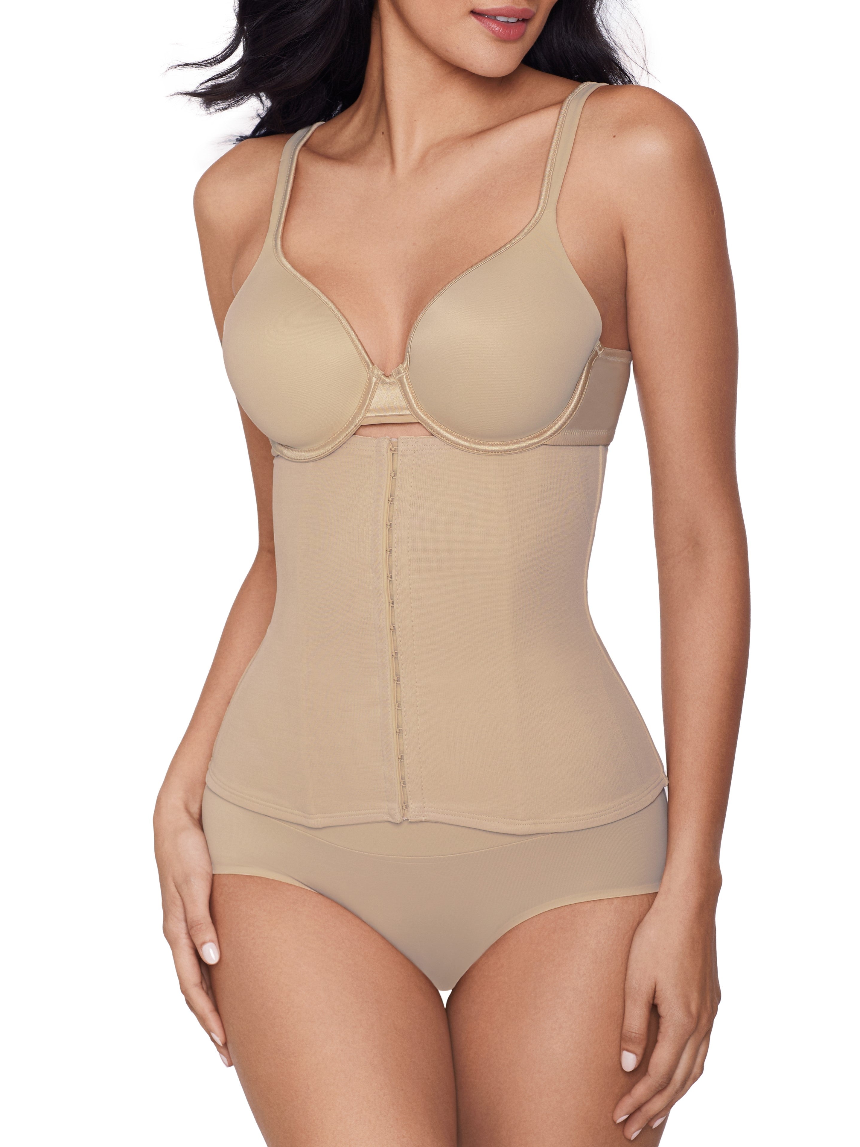 a woman wearing a beige waist cincher