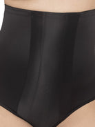 a close-up detail of a woman wearing black high waisted tummy control underwear