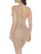 a woman wearing nude high waisted tummy control shapewear shorts