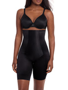 a woman wearing a black high waisted tummy control thigh slimmer shaping short miraclesuit shapewear