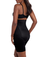 a woman wearing a black high waisted tummy control thigh slimmer shaping short miraclesuit shapewear
