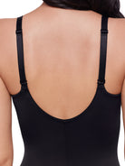 a closeup of adjustable straps on a woman wearing a black sheer tummy control body shaper