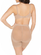 a woman wearing a nude butt lift tummy control shapewear short