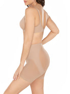 a woman wearing a nude butt lift tummy control shapewear short