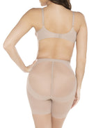 a woman wearing a nude butt lift tummy control shapewear short