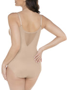 a woman wearing a nude sheer tummy control body shaper bodysuit shapewear