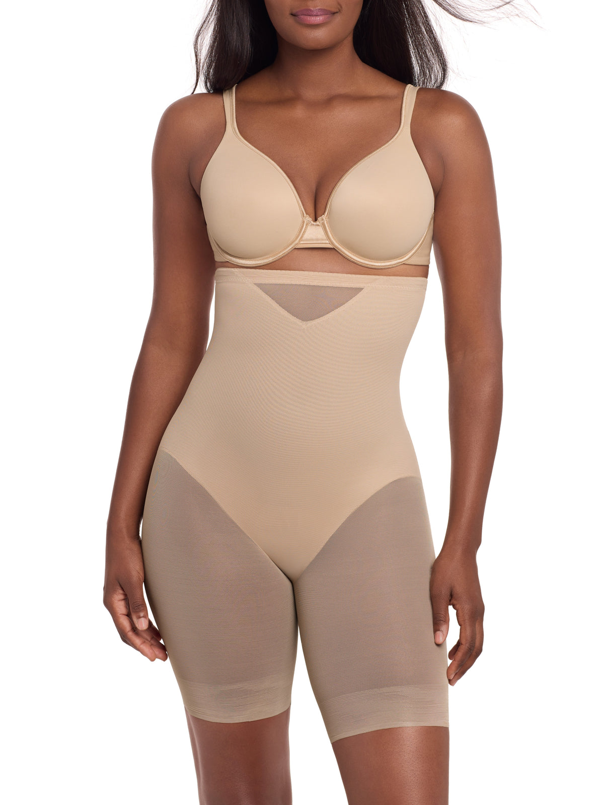 a woman wearing a beige sheer shapewear high waisted tummy control short thigh slimmer miraclesuit shapewear