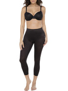 a woman wearing a black tummy control leggings shapewear