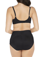 a woman wearing black tummy control underwear shapewear