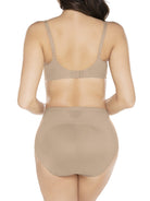 a woman wearing nude tummy control underwear shapewear