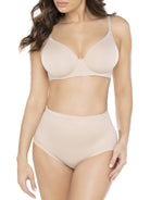 a woman wearing a beige shaping brief