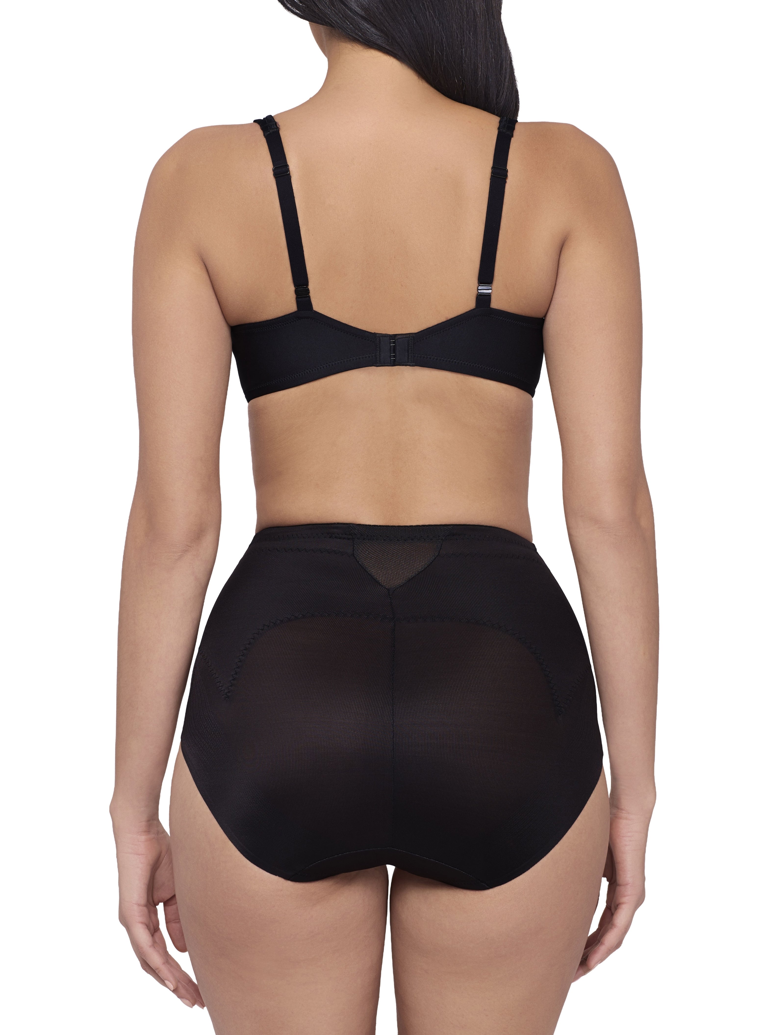 a woman wearing black tummy control underwear shapewear