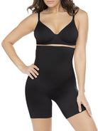 a woman wearing a black high waisted tummy control shapewear short