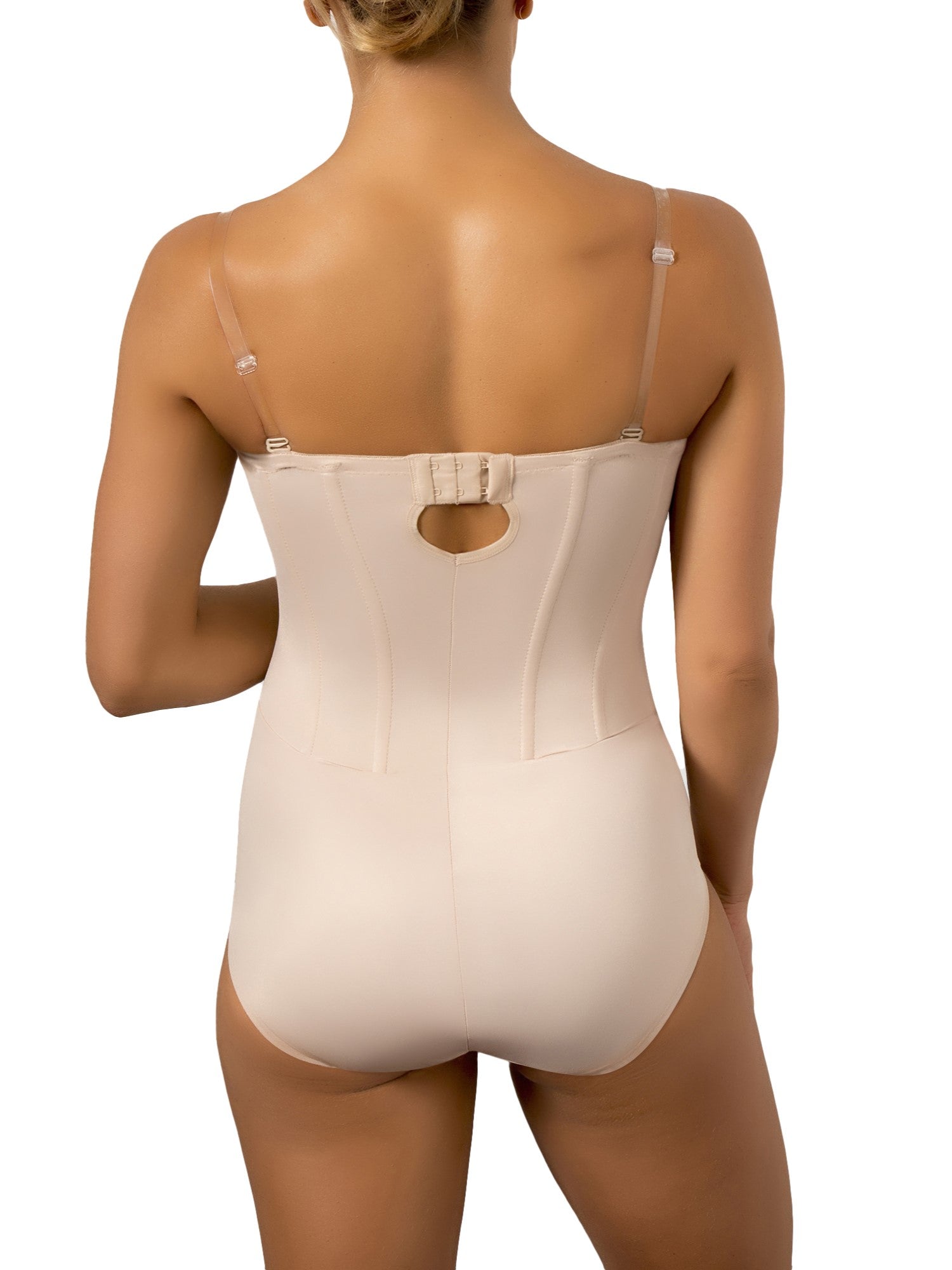 a women wearing a nude strapless tummy control body shaper shapewear