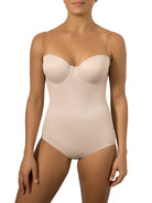 a women wearing a nude strapless tummy control body shaper shapewear