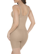 a woman wearing a nude open-bust tummy control bodysuit