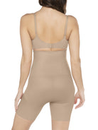 a woman wearing a nude high waisted tummy control shapewear short