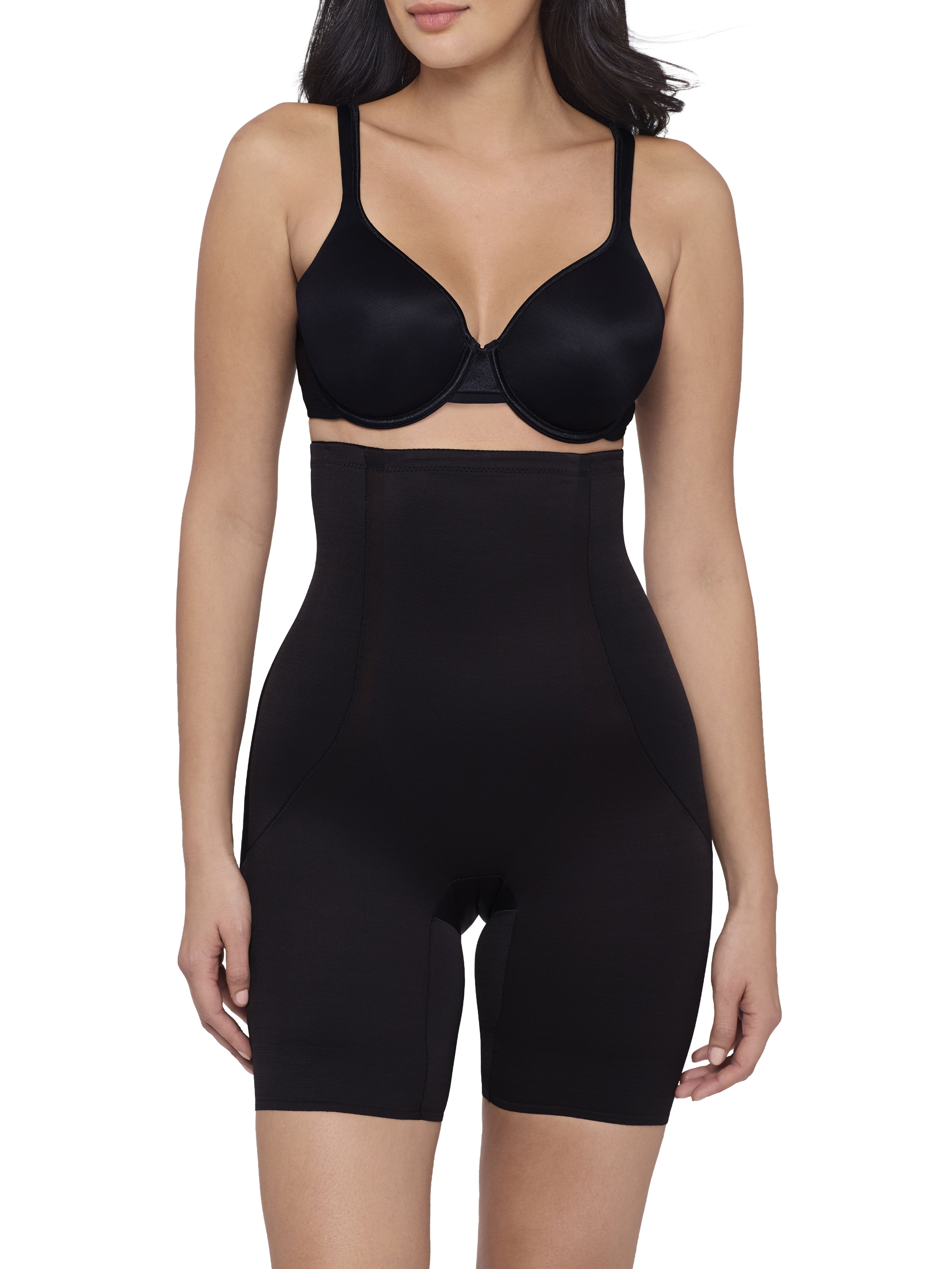 a woman wearing a black high waisted tummy control shaping short back smoothing body shapewear miraclesuit shapewear